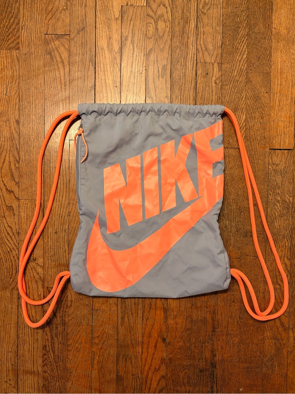 Nike Light Gray Drawstring Backpack with Coral Logo